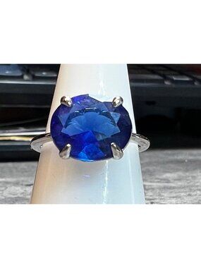 Ring Bomb Party Ring,  size 7, Blue stone silver color band